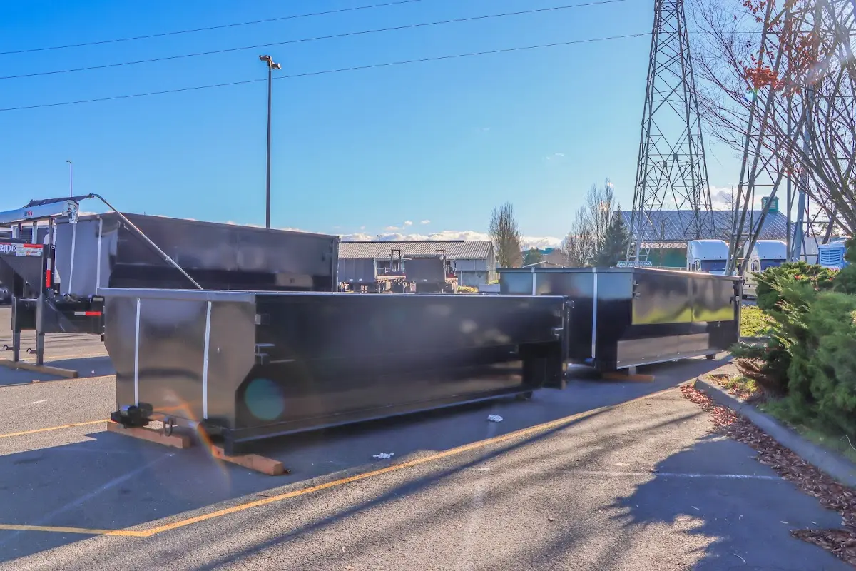 Roll-off dumpster ready for waste disposal at job site for 15 Yard Dumpster Rental in Miramar Beach
